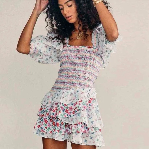 Yvonne & Love Dresses & Skirts - Yvonne & Love Smocked Disty Floral Asymmetric Ruffle Mini‎ Dress Flirty Dainty